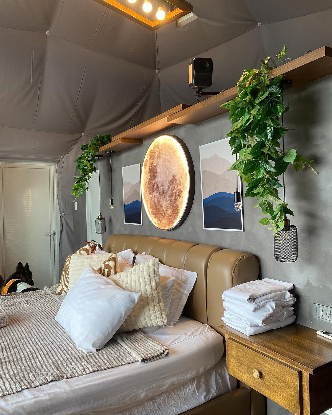 Kalinaya dome interior with moon lamp — warm evening light